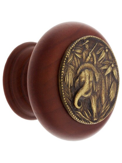 Hardwood Knob with Elephant Onlay - 1 1/2 inch Diameter in Cherry/Antique Brass.